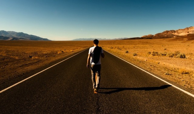 man-walking-down-road-alone-640x376